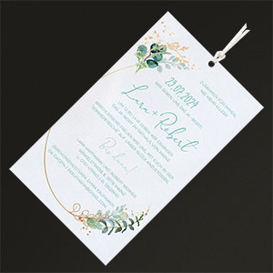 Vergrößerte Abbildung Der bedruckte Texteinleger, umrandet von Eukalyptusranken