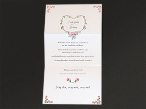 – vergrößerte Abbildung Die aufgeklappte Einladungskarte.